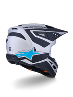 Alpinestars S-M3 Heat Helmet ECE 22.06, casco da motocross, argento, blu e nero opaco, vista posteriore con grande logo a stella blu e motivi angolari neri, calotta aerodinamica con porte di ventilazione, protezione per corse off-road ad alte prestazioni