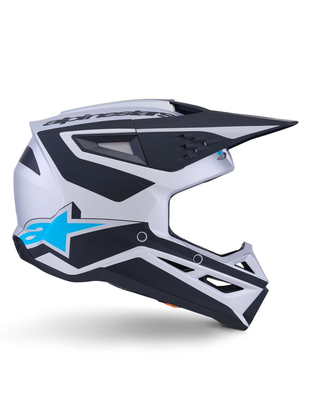 Casco Alpinestars S-M3 Heat ECE 22.06, casco da motocross, argento, blu e nero opaco, vista laterale con grafiche nere decise, logo A-star blu brillante, visiera aerodinamica nera e diverse porte di ventilazione per prestazioni fuoristrada