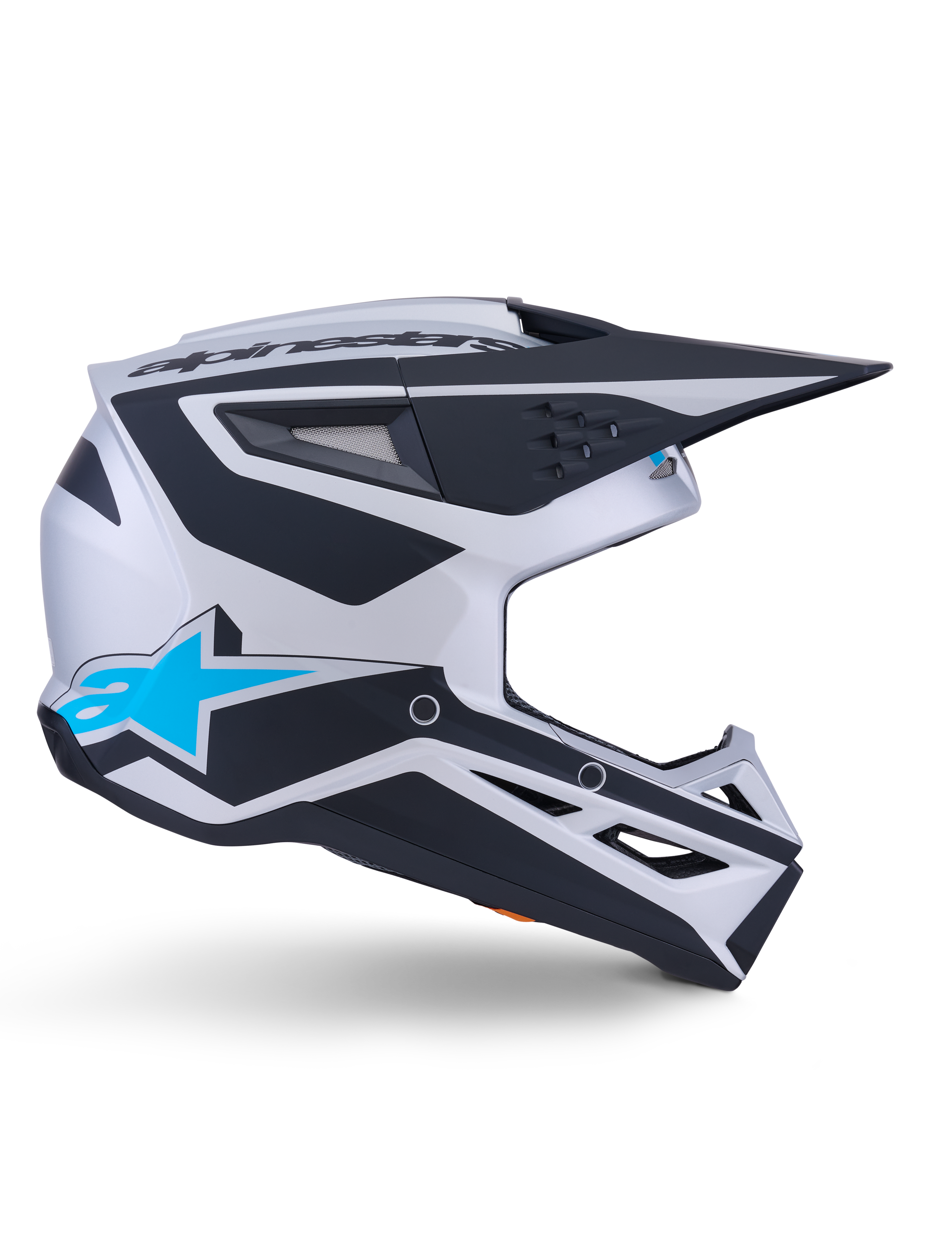 Casco Alpinestars S-M3 Heat ECE 22.06, casco da motocross, argento, blu e nero opaco, vista laterale con grafiche nere decise, logo A-star blu brillante, visiera aerodinamica nera e diverse porte di ventilazione per prestazioni fuoristrada