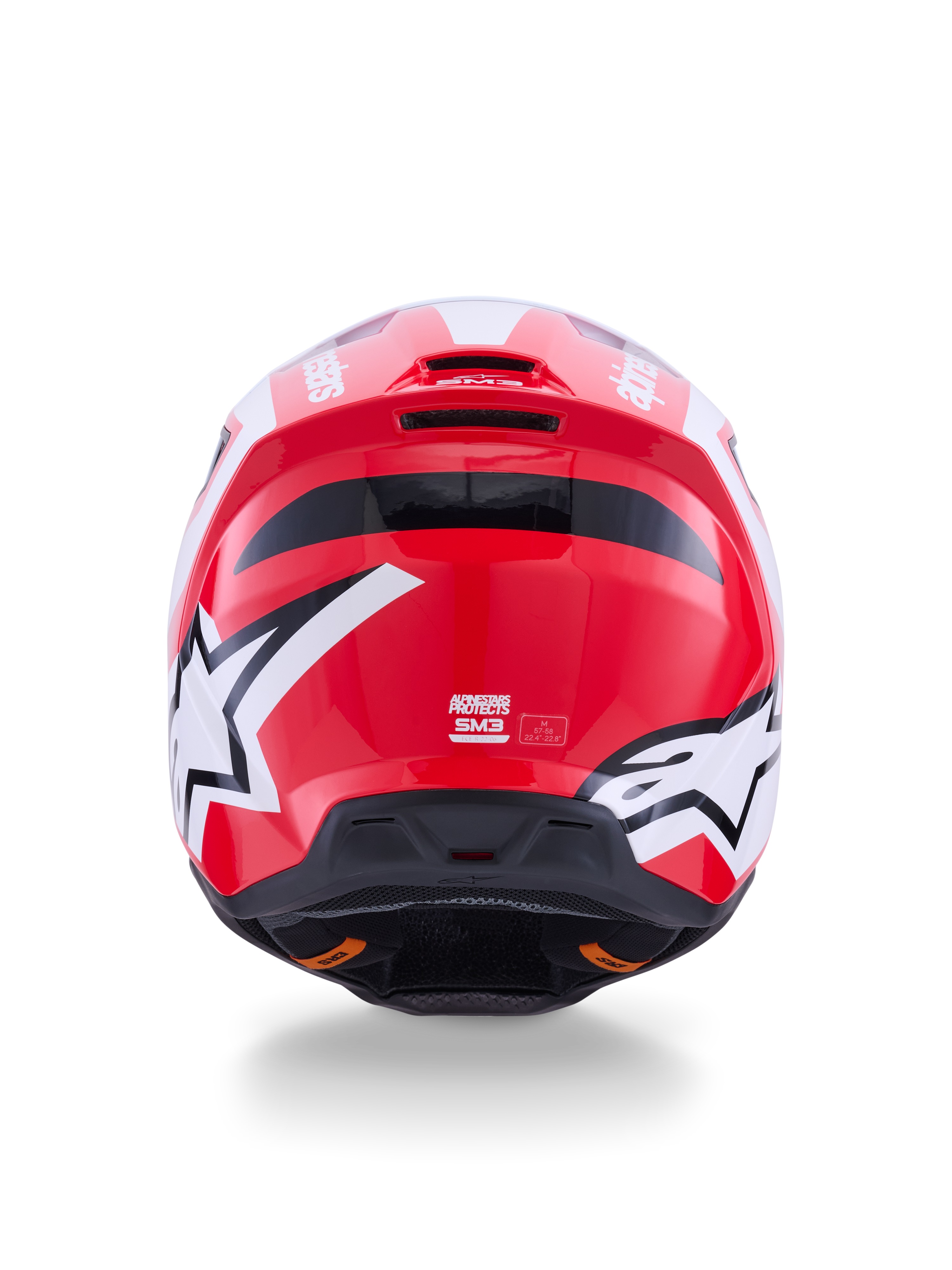 Alpinestars S-M3 Heat, casco da motocross rosso e bianco, vista posteriore con loghi a stella e estrattori d'aria integrati.