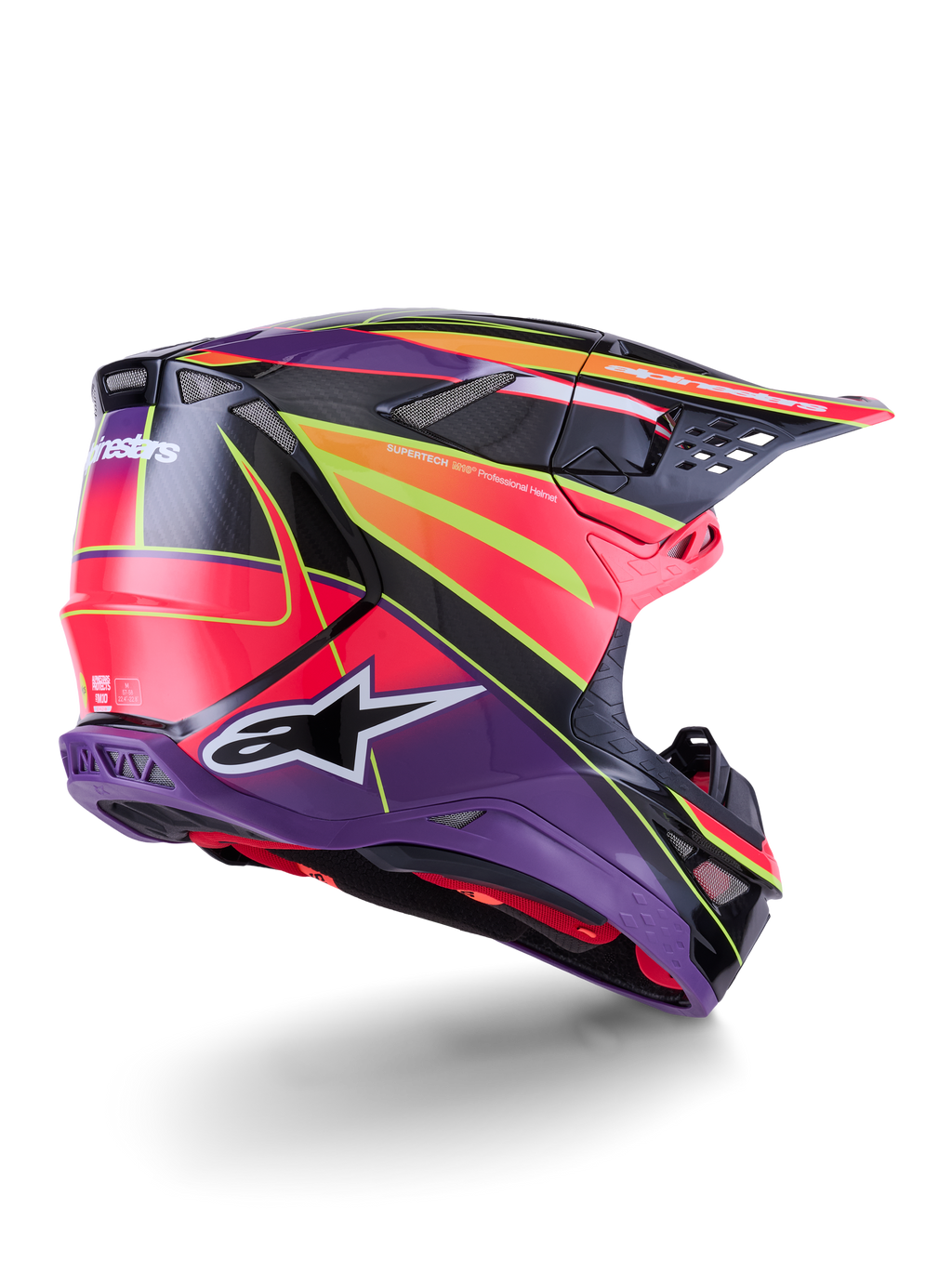 Casco Alpinestars Supertech M10 Era, casco da motocross, rosa, viola e giallo fluo lucido, vista posteriore a tre quarti che mostra la calotta aerodinamica in fibra di carbonio, le porte di ventilazione integrate e la grafica audace del brand, attrezzatura da corsa fuoristrada ad alte prestazioni