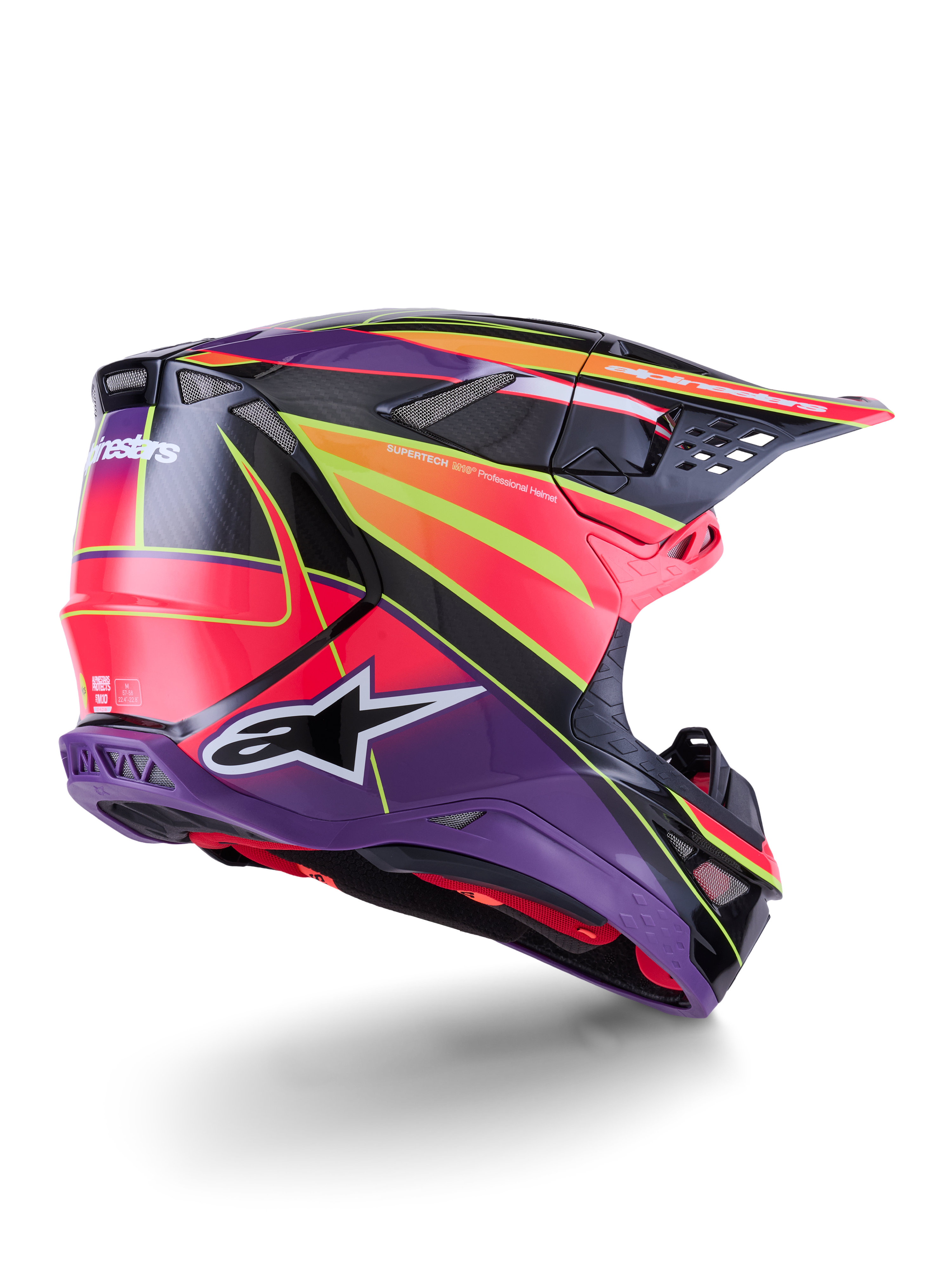 Casco Alpinestars Supertech M10 Era, casco da motocross, rosa, viola e giallo fluo lucido, vista posteriore a tre quarti che mostra la calotta aerodinamica in fibra di carbonio, le porte di ventilazione integrate e la grafica audace del brand, attrezzatura da corsa fuoristrada ad alte prestazioni