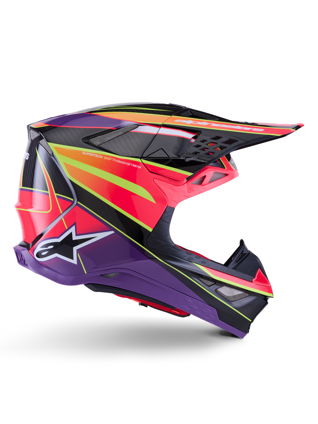 Casco Alpinestars Supertech M10 Era, casco da motocross, rosa, viola e giallo fluo lucido, vista laterale di profilo, caratterizzato da una calotta in carbonio multi-composito con motivi geometrici vivaci, prese d'aria integrate e logo Alpinestars bianco, progettato per prestazioni fuoristrada d'élite.
