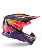 Casco Alpinestars Supertech M10 Era, casco da motocross, rosa, viola e giallo fluo lucido, vista laterale di profilo, caratterizzato da una calotta in carbonio multi-composito con motivi geometrici vivaci, prese d'aria integrate e logo Alpinestars bianco, progettato per prestazioni fuoristrada d'élite.