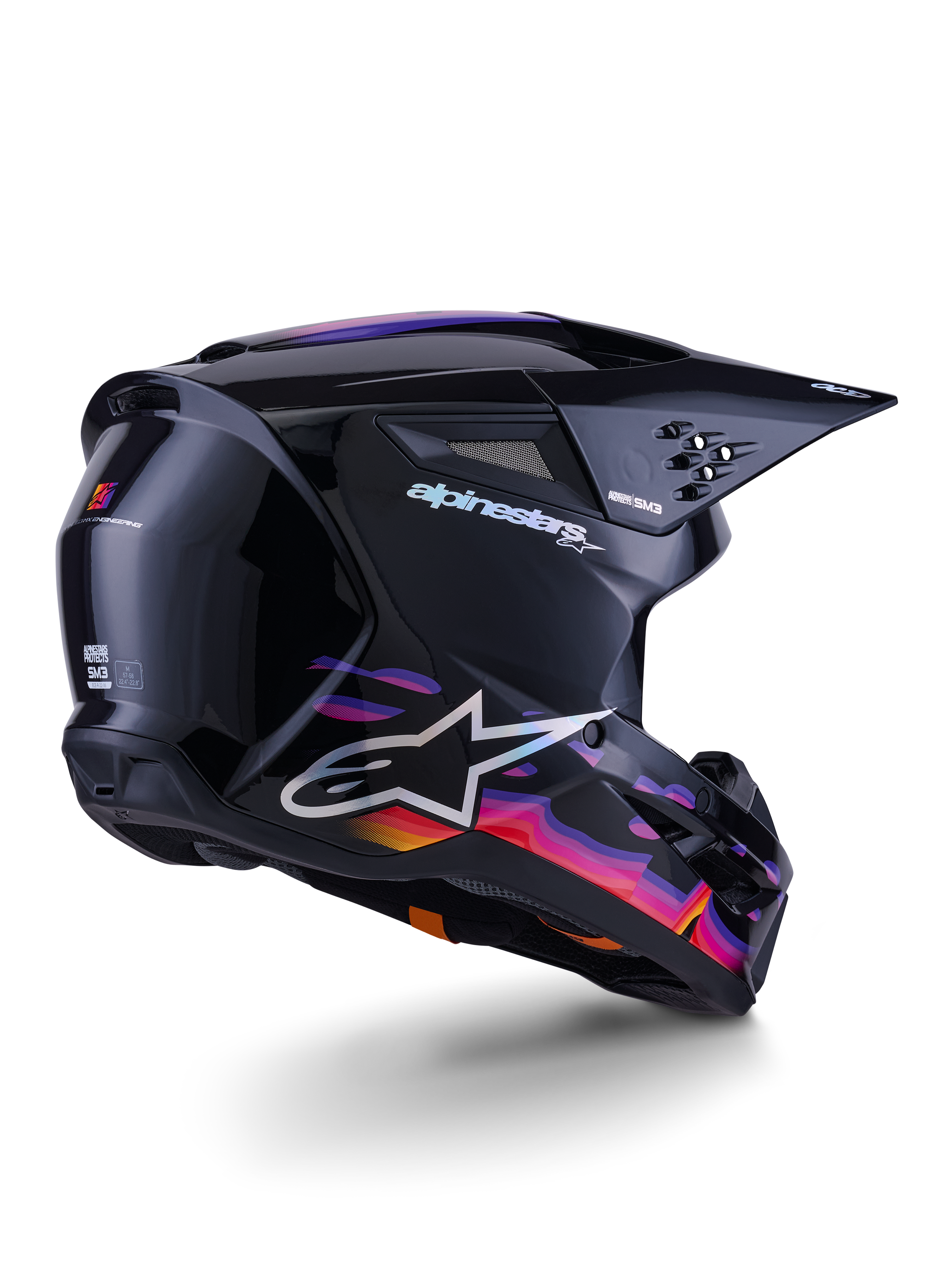Casco Alpinestars S-M3 Force OCD, casco da motocross, nero lucido con vivaci grafiche a onde viola, rosa e arancione, con branding Alpinestars e logo A-star bianchi, vista a tre quarti posteriore, equipaggiamento da gara fuoristrada ad alte prestazioni