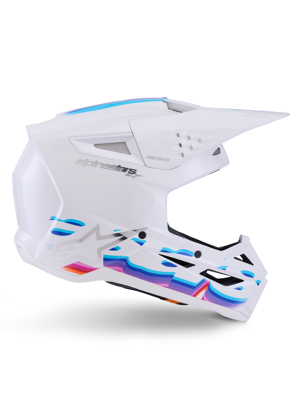 Casco Alpinestars S-M3 Force OCD, White Glossy, casco da motocross con grafiche a onde vivaci in blu, viola e arancione, profilo laterale con visiera aerodinamica e diverse prese di ventilazione.