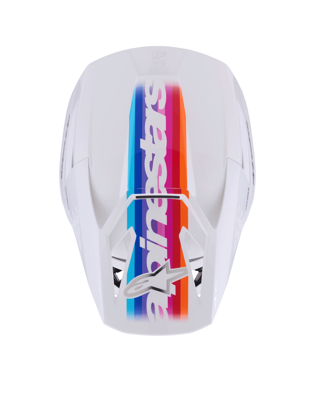 Casco Alpinestars S-M3 Force OCD, casco da motocross, bianco lucido, vista dall'alto con vivace striscia centrale multicolore in blu, viola, rosso e arancione, marchio e logo a stella Alpinestars bianchi, protezione professionale per la testa fuoristrada