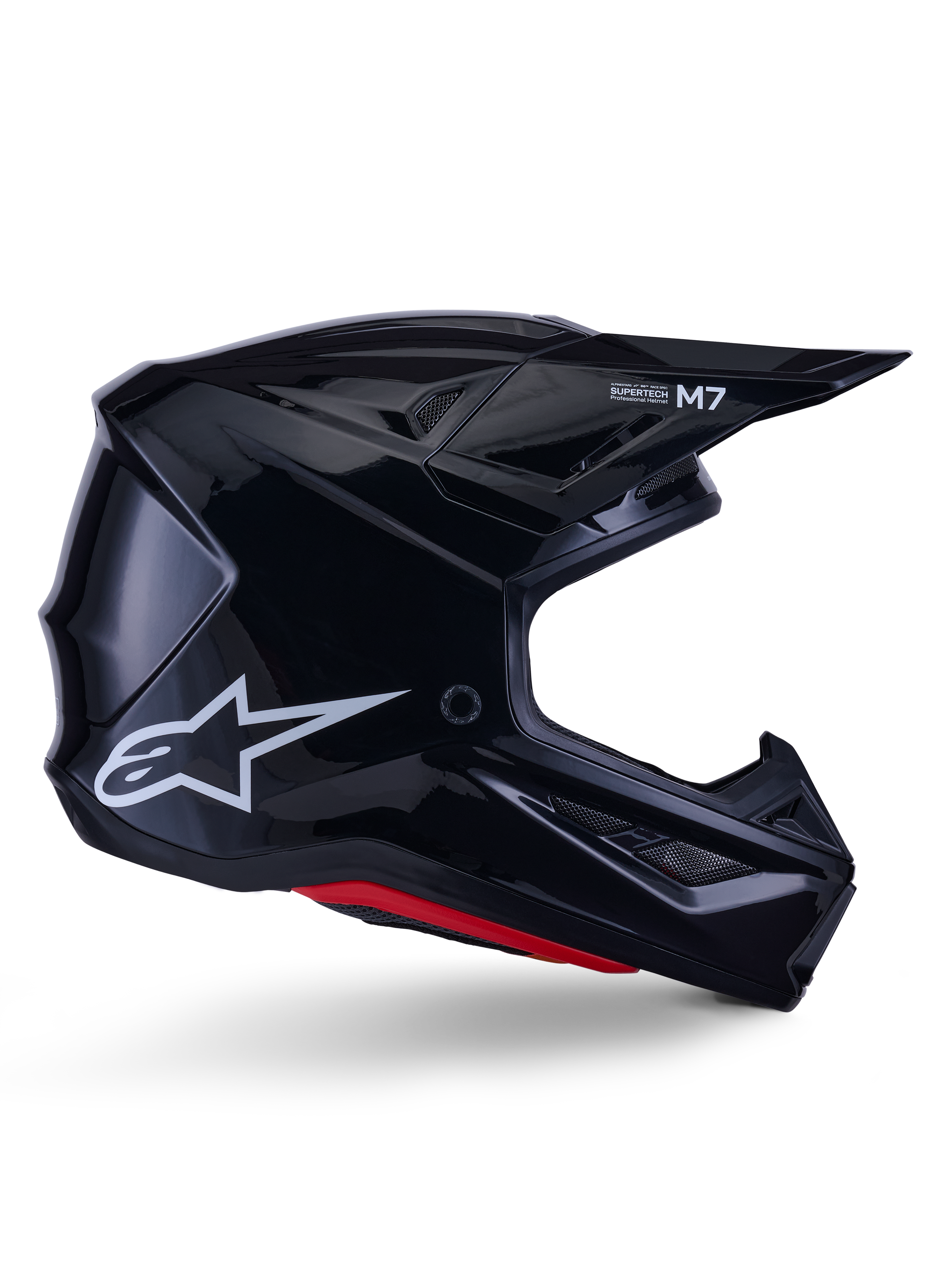 Alpinestars S-M7 Solid Helmet, casco da motocross, nero lucido con logo a stella bianco e dettagli rossi, profilo laterale con design aerodinamico, prese d'aria in rete e branding Supertech M7 sulla visiera