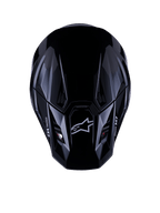Alpinestars S-M7 Solid Helmet ECE 22.06, casco da motocross, nero lucido, vista dall'alto che mostra la calotta aerodinamica in materiale composito con logo Astars e marchio M7, design elegante con prese di ventilazione per prestazioni da competizione off-road