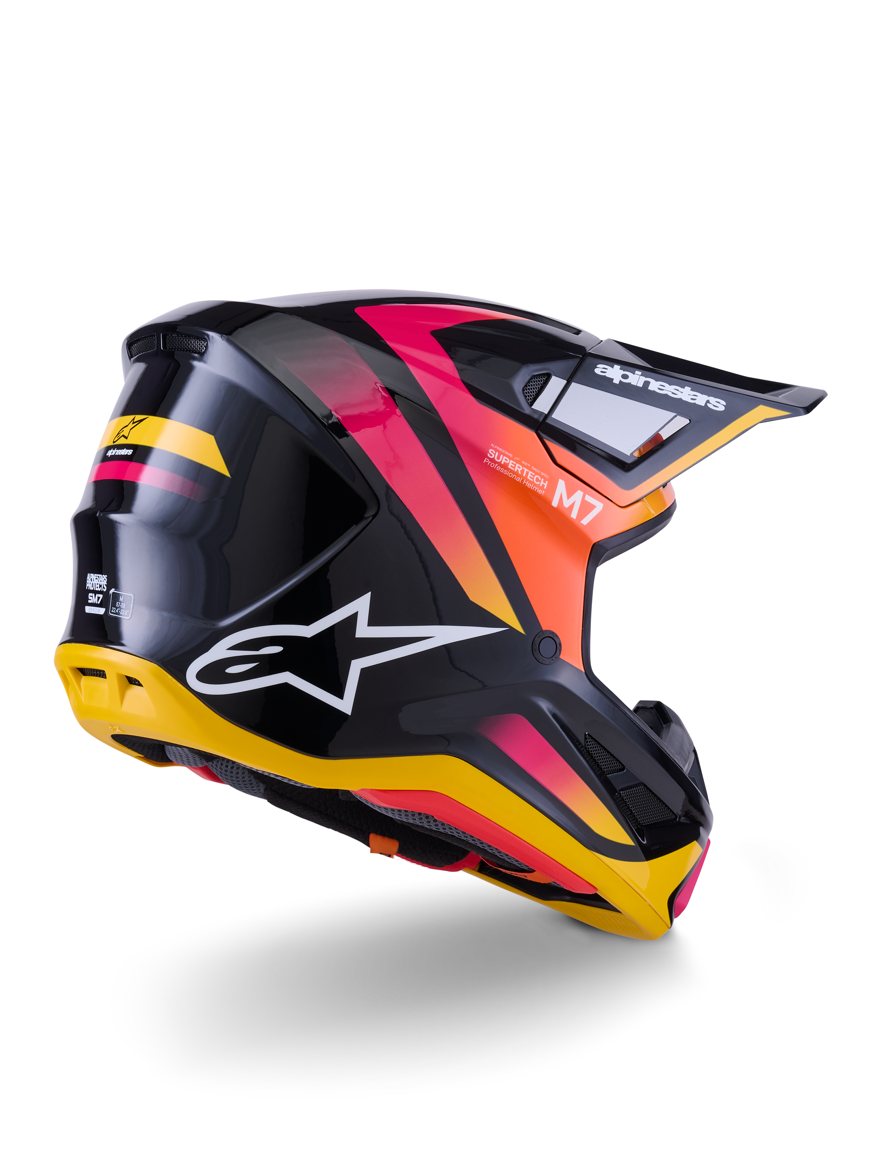 Casco Alpinestars S-M7 Rise, casco da motocross, nero, giallo e rosa lucido, vista posteriore e laterale con calotta aerodinamica in materiale composito, sfumature vivaci, loghi evidenti e prese d'aria