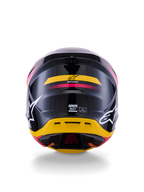 Alpinestars S-M7 Rise Helmet ECE 22.06, casco da motocross, vista posteriore, nero lucido con accenti gialli e rosa, grandi loghi bianchi sui lati, calotta aerodinamica in materiale composito, equipaggiamento da gara off-road