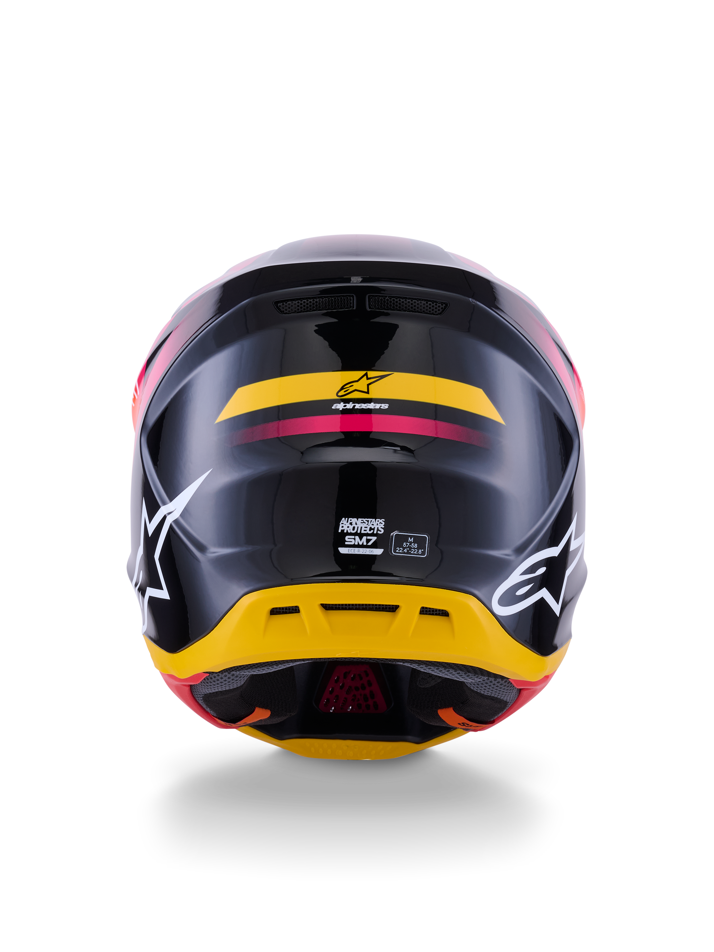 Alpinestars S-M7 Rise Helmet ECE 22.06, casco da motocross, vista posteriore, nero lucido con accenti gialli e rosa, grandi loghi bianchi sui lati, calotta aerodinamica in materiale composito, equipaggiamento da gara off-road