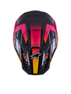 Casco Alpinestars S-M7 Rise ECE 22.06, casco da motocross, nero, rosa e giallo lucido, vista dall'alto che mostra la calotta aerodinamica in materiale composito, vivace design sfumato, prese d'aria e logo Alpinestars bianco sulla parte anteriore