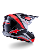Casco Alpinestars S-M7 Rise, casco da motocross, nero, argento e rosso fluo lucido, vista posteriore di tre quarti, con logo A-star rosso e accenti argento, calotta aerodinamica con visiera, protezione professionale per il fuoristrada