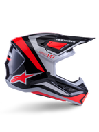 Casco Alpinestars S-M7 Rise, casco da motocross, nero, argento e rosso fluo, vista laterale con design aerodinamico angolare, visiera e prese d'aria, finitura lucida, serie Supertech M7