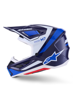 Casco Alpinestars S-M7 Rise, casco da motocross, blu, bianco e navy lucido, vista di profilo laterale con marchio Alpinestars sulla visiera e sul fianco, scritte M7 e Supertech, calotta aerodinamica con prese d'aria, finitura lucida per prestazioni off-road