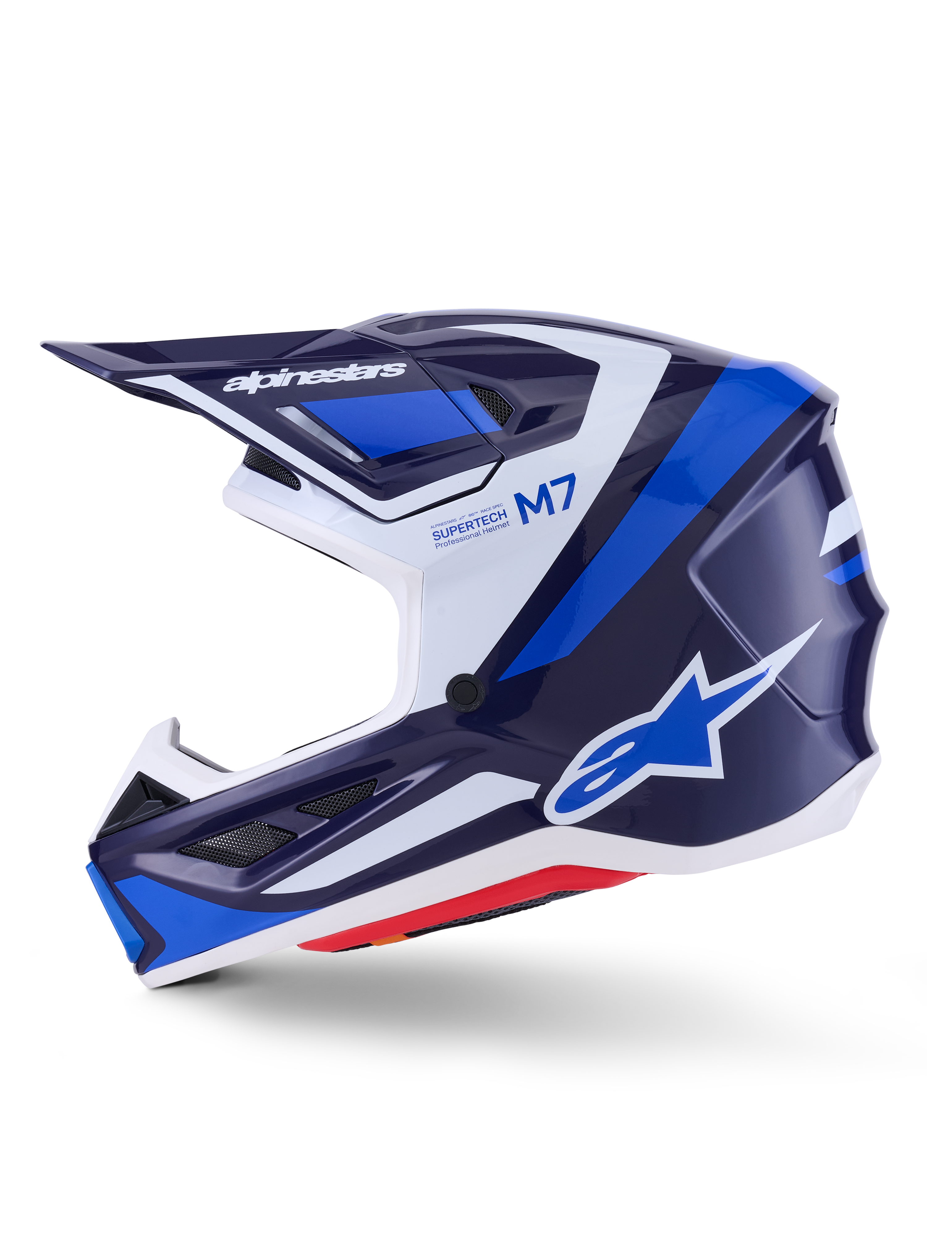 Casco Alpinestars S-M7 Rise, casco da motocross, blu, bianco e navy lucido, vista di profilo laterale con marchio Alpinestars sulla visiera e sul fianco, scritte M7 e Supertech, calotta aerodinamica con prese d'aria, finitura lucida per prestazioni off-road