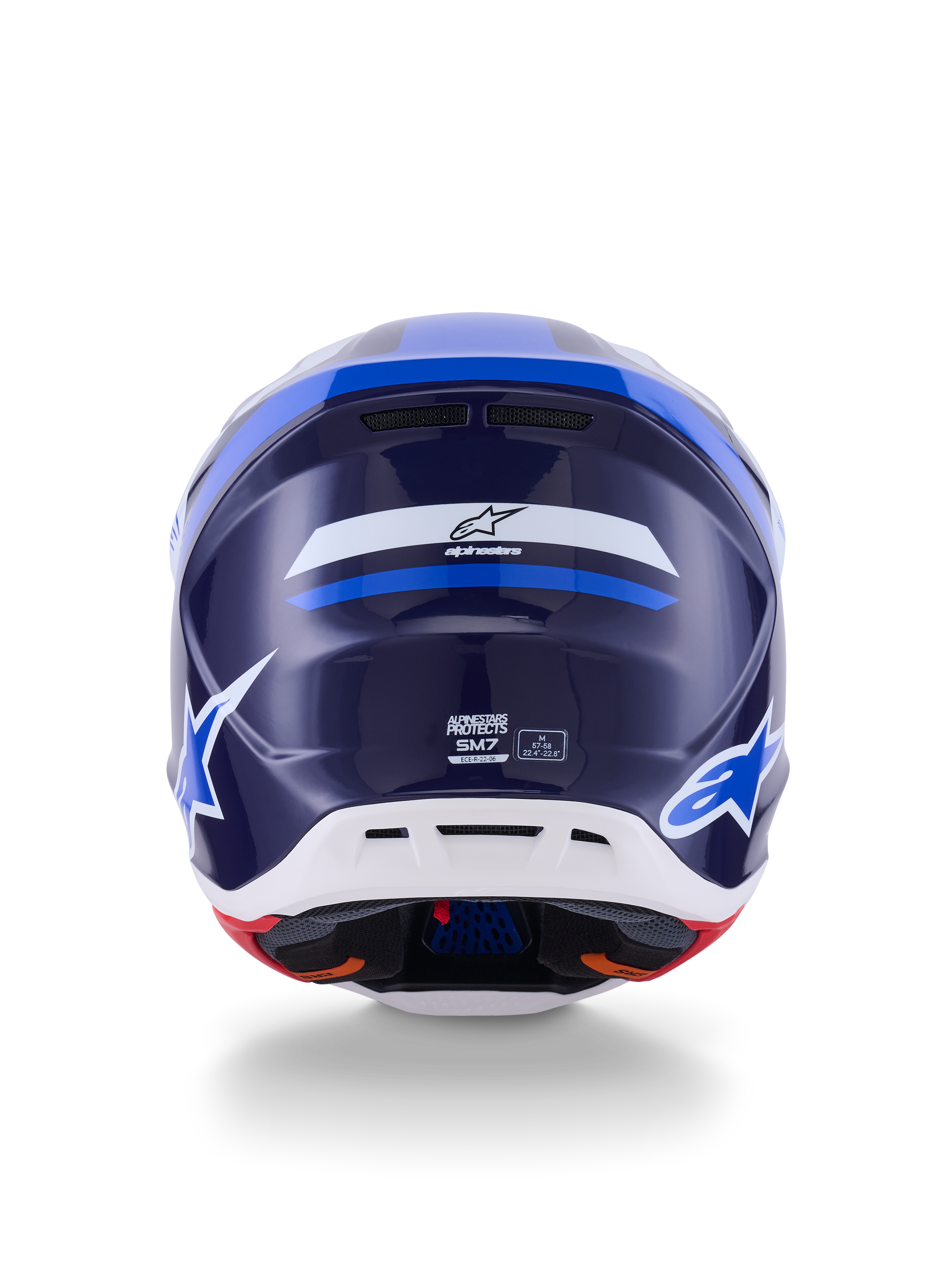Casco Alpinestars S-M7 Rise, vista posteriore, blu e bianco lucido, con logo Alpinestars e marchio SM7, calotta aerodinamica in materiale composito con sezione inferiore bianca e porte di ventilazione, protezione per la testa da motocross ad alte prestazioni