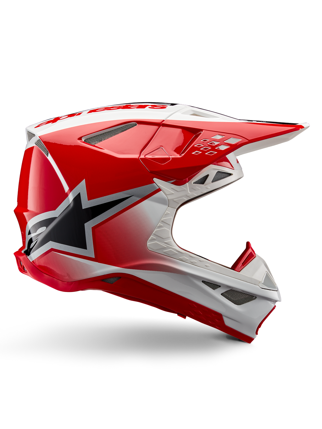 Alpinestars Supertech M10 Unite Helmet, casco da motocross, rosso e bianco lucido, con vista laterale, motivi geometrici angolari, grafica con stella nera, prese d'aria multiple in rete e design aerodinamico per corse off-road