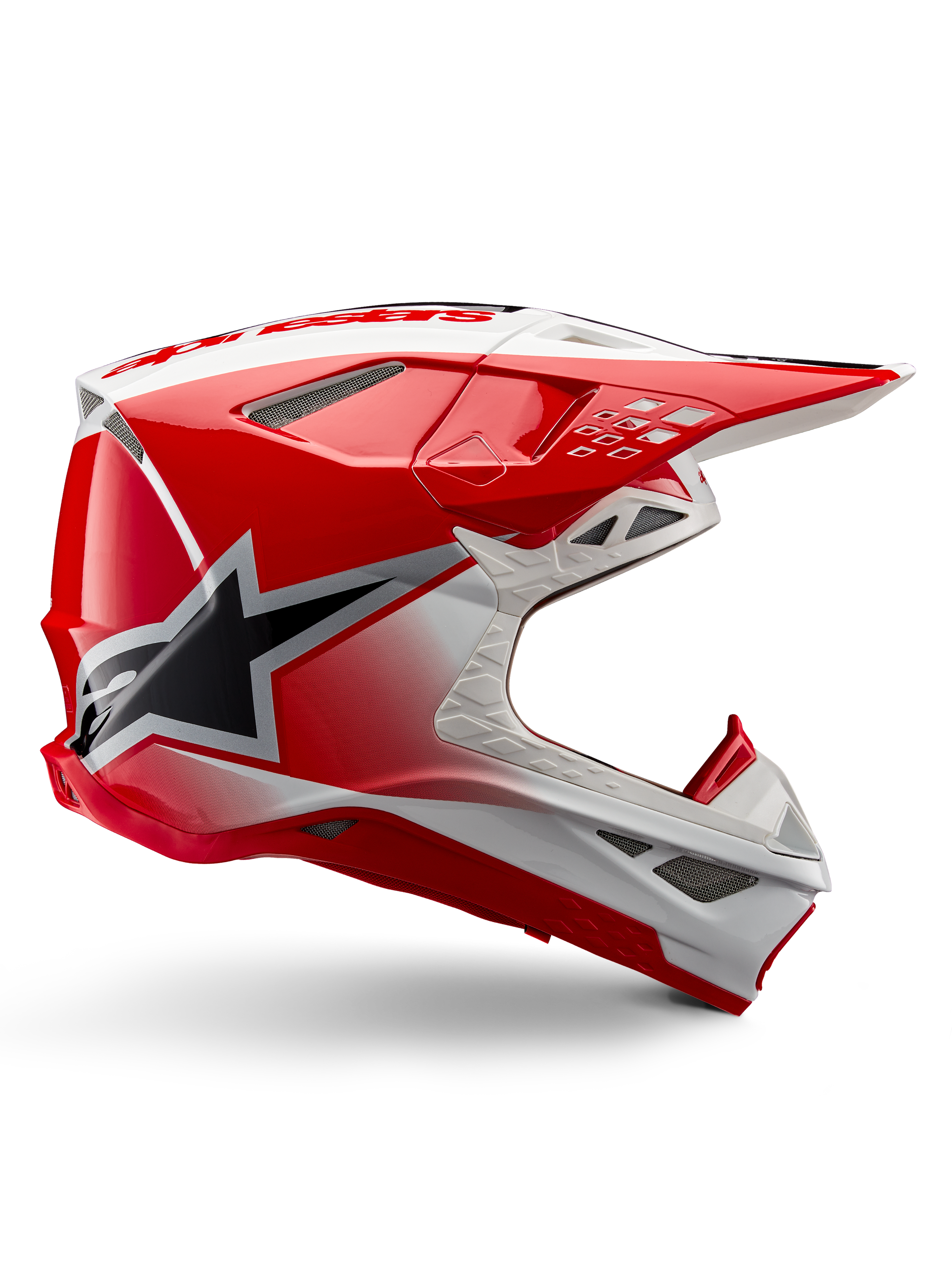 Alpinestars Supertech M10 Unite Helmet, casco da motocross, rosso e bianco lucido, con vista laterale, motivi geometrici angolari, grafica con stella nera, prese d'aria multiple in rete e design aerodinamico per corse off-road
