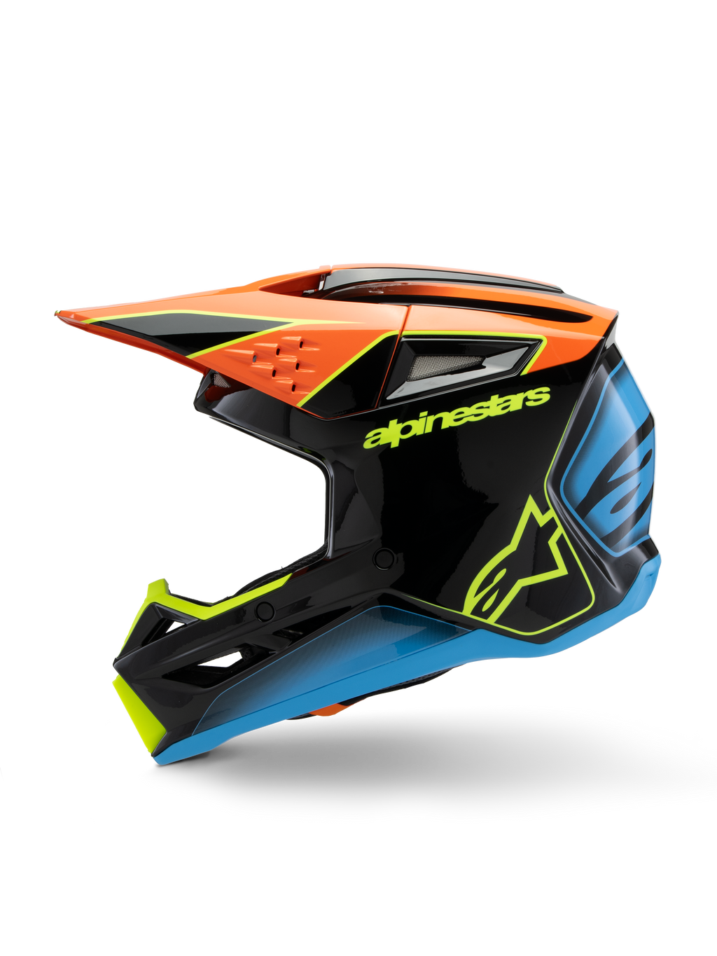 Casco Alpinestars S-M3 Youth Fray, casco da motocross, nero con accenti arancione, giallo e blu, vista laterale di profilo, con logo Alpinestars in evidenza, design aggressivo con visiera ampia e prese d'aria, equipaggiamento protettivo lucido per giovani piloti off-road