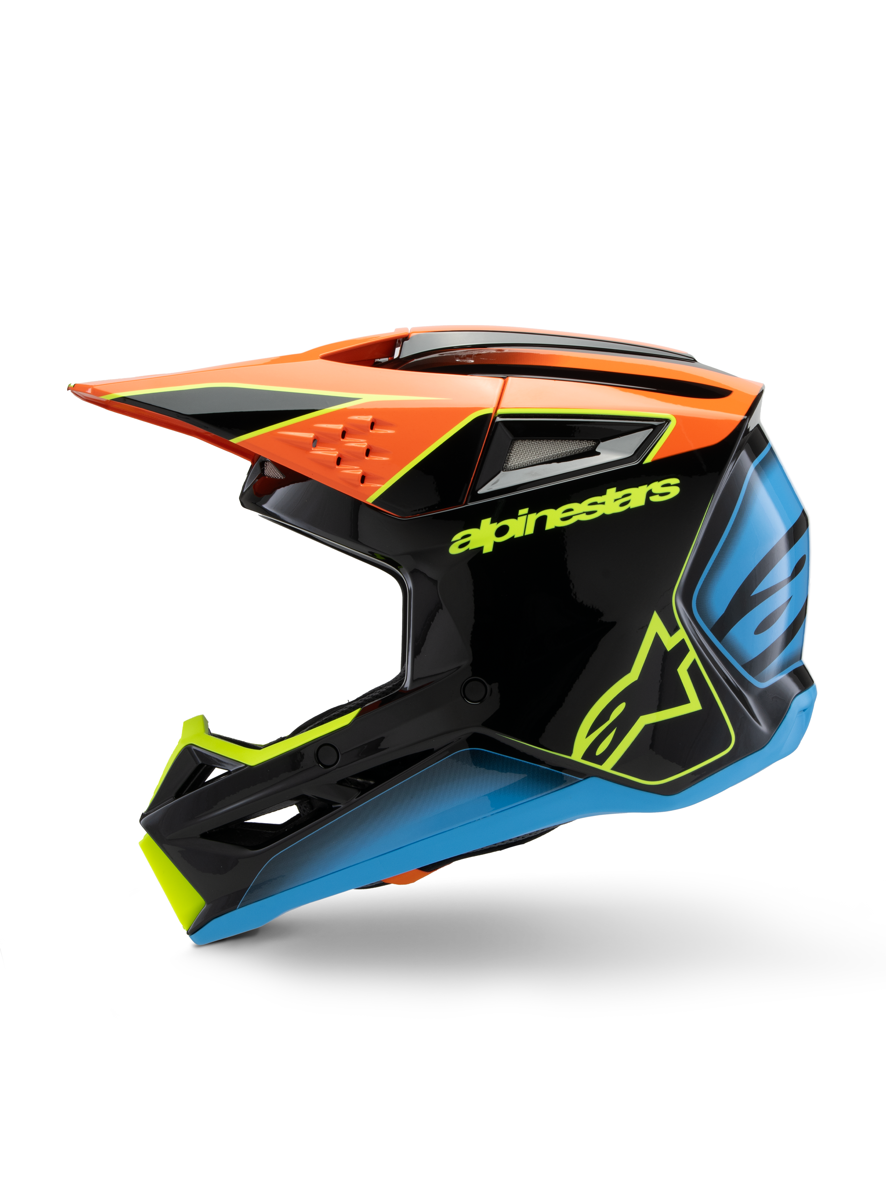 Casco Alpinestars S-M3 Youth Fray, casco da motocross, nero con accenti arancione, giallo e blu, vista laterale di profilo, con logo Alpinestars in evidenza, design aggressivo con visiera ampia e prese d'aria, equipaggiamento protettivo lucido per giovani piloti off-road