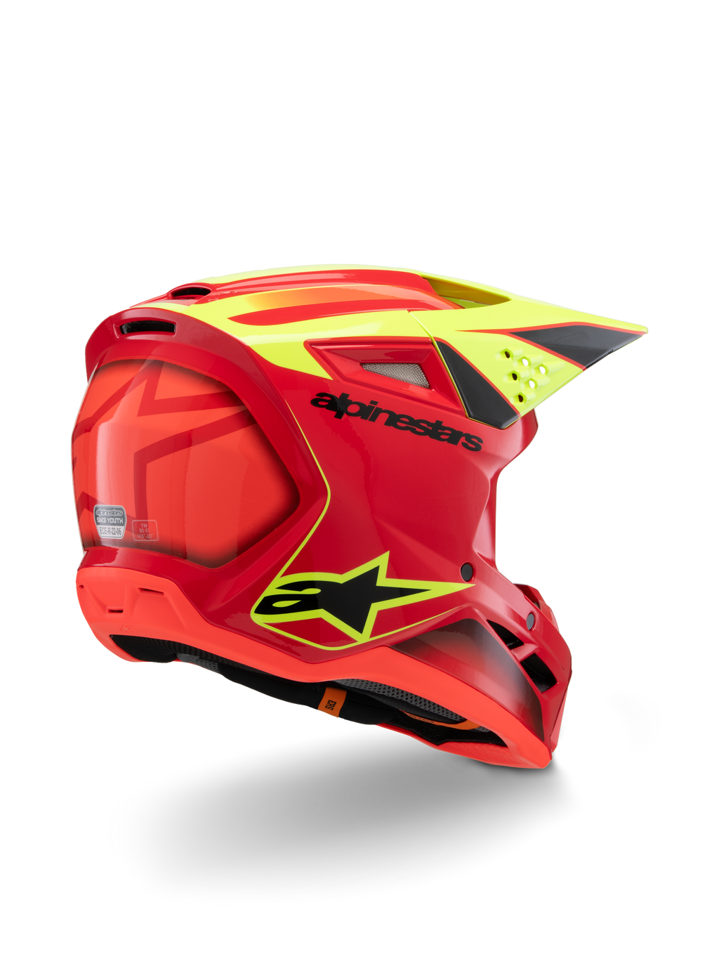 Casco Alpinestars S-M3 Youth Fray, rosso e giallo fluo lucido, vista posteriore di tre quarti, con loghi neri e prese d'aria aerodinamiche, casco da motocross per ragazzi ad alta visibilità