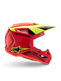 Alpinestars S-M3 Youth Fray Helmet, casco da motocross, rosso, giallo fluo e nero lucido, vista di profilo che mostra un design aerodinamico con visiera integrata e prese d'aria, branding nero su calotta rossa, ottimizzato per prestazioni off-road per ragazzi