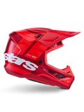 Casco Alpinestars S-M7 Core, casco da motocross, rosso lucido con accenti rosso scuro e branding bianco, vista laterale con grande logo stars bianco, calotta aerodinamica con prese d'aria in rete e visiera prominente