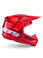 Casco Alpinestars S-M7 Core, casco da motocross, rosso lucido con accenti rosso scuro e branding bianco, vista laterale con grande logo stars bianco, calotta aerodinamica con prese d'aria in rete e visiera prominente