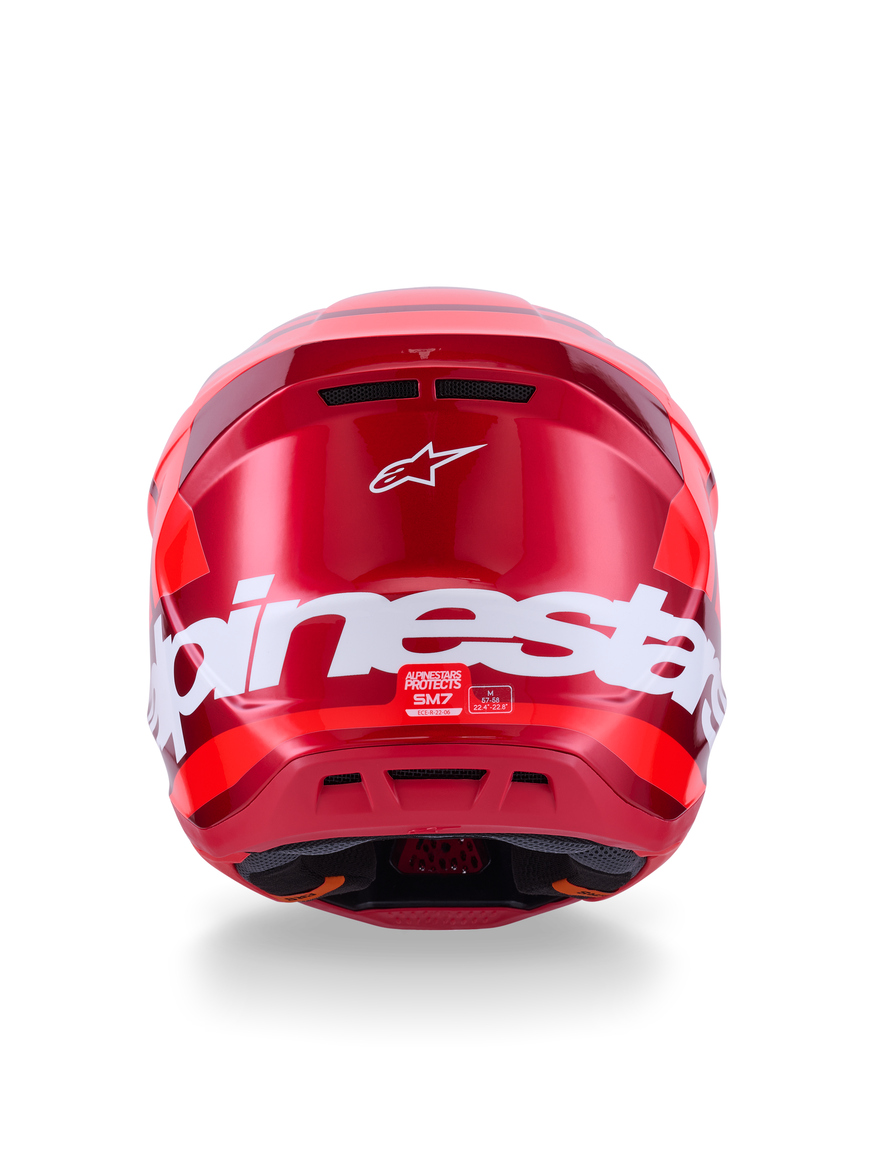 Casco Alpinestars S-M7 Core, rosso lucido, vista posteriore con grande marchio Alpinestars bianco, calotta aerodinamica con porte di ventilazione integrate, protezione professionale per la testa da motocross