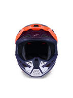 Casco Alpinestars S-M7 Core, casco da motocross, arancione e blu opaco, vista frontale con accenti bianchi sulla mentoniera, con branding "One Goal - One Vision", calotta aerodinamica per gare off-road