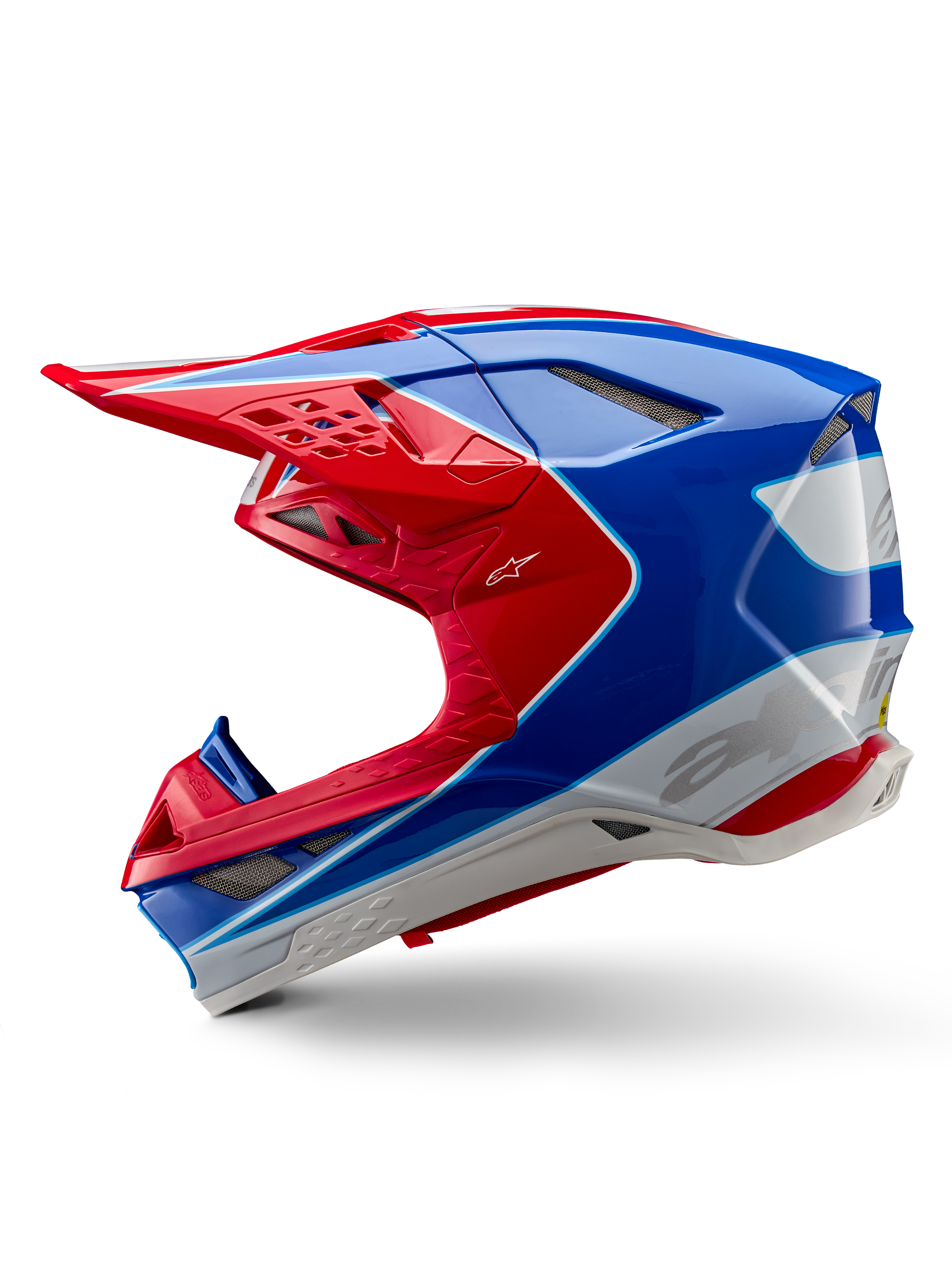 Casco Alpinestars Supertech M10 Aeon ECE 22.06, casco da motocross, rosso e blu lucido, vista di profilo laterale, calotta multi-composita aerodinamica con prese d'aria integrate e design grafico rosso e blu, finitura lucida per gare fuoristrada