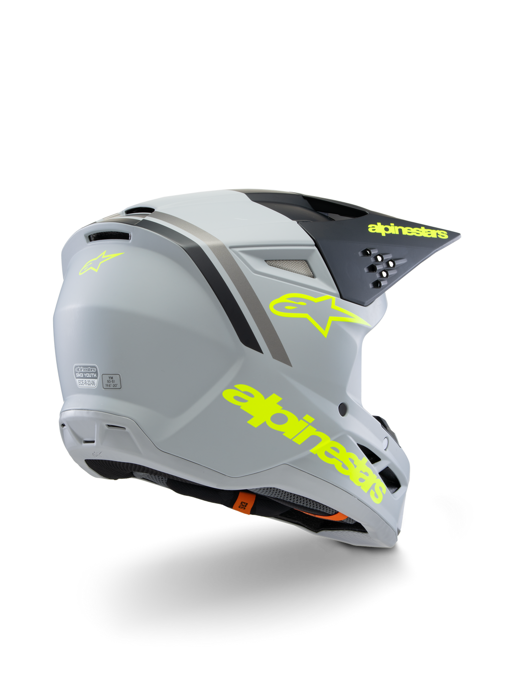 Alpinestars S-M3 Youth Radium Helmet ECE 22.06, casco da motocross, grigio, nero e giallo fluo opaco, vista posteriore a tre quarti con marchio e logo a stella gialli, calotta aerodinamica ventilata per fuoristrada