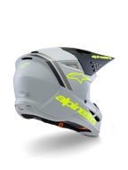 Alpinestars S-M3 Youth Radium Helmet ECE 22.06, casco da motocross, grigio, nero e giallo fluo opaco, vista posteriore a tre quarti con marchio e logo a stella gialli, calotta aerodinamica ventilata per fuoristrada