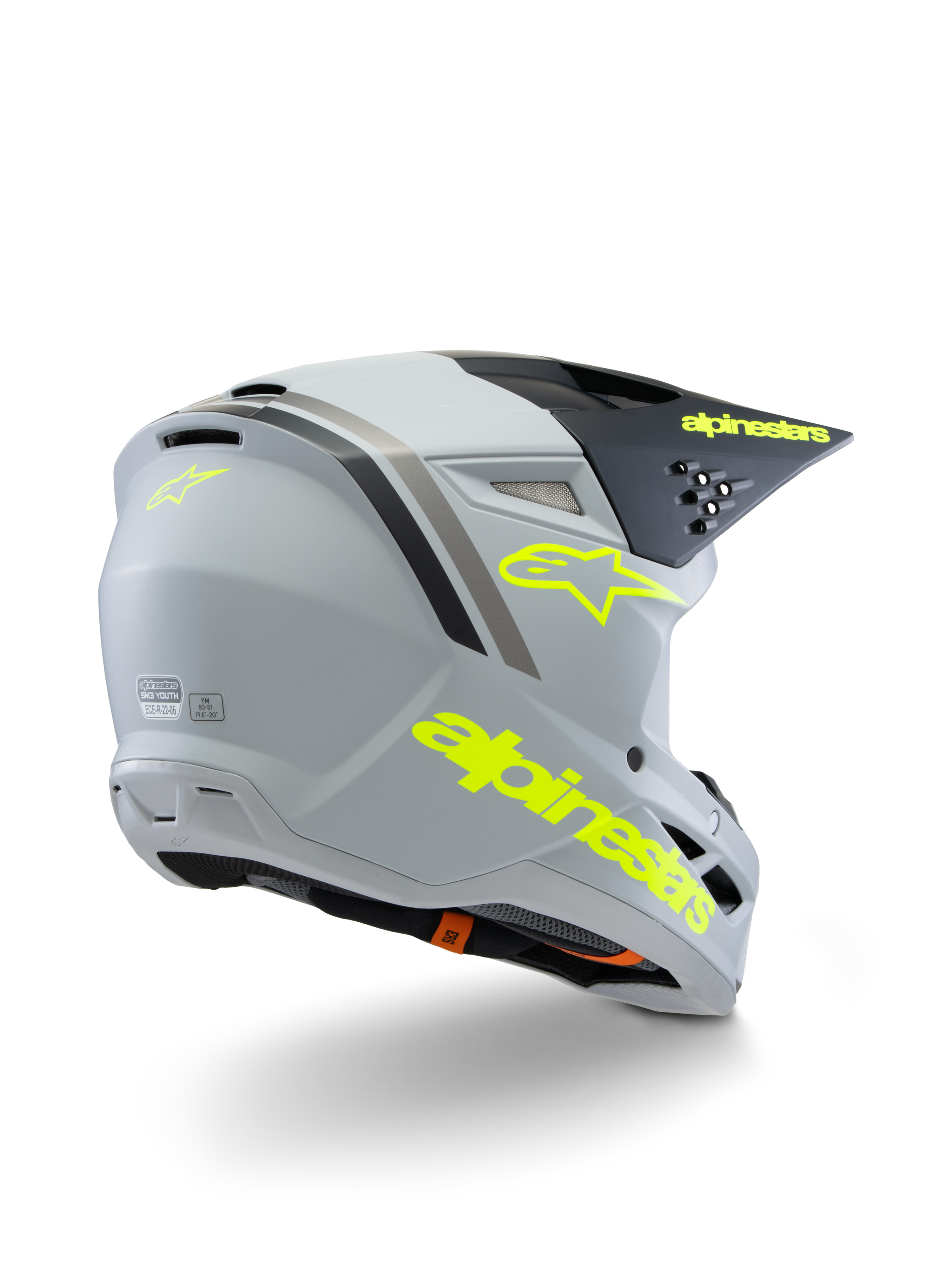 Alpinestars S-M3 Youth Radium Helmet ECE 22.06, casco da motocross, grigio, nero e giallo fluo opaco, vista posteriore a tre quarti con marchio e logo a stella gialli, calotta aerodinamica ventilata per fuoristrada