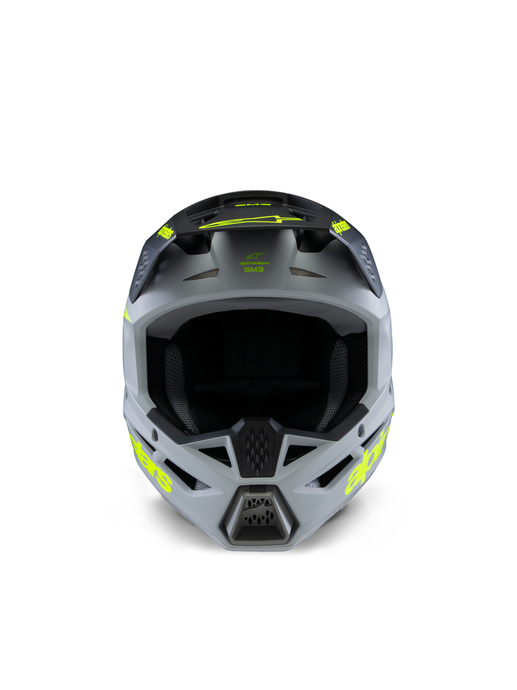 Casco Alpinestars S-M3 Youth Radium, casco da motocross, grigio, nero e giallo fluo opaco, vista frontale con calotta angolare aggressiva, loghi gialli vivaci sui lati e sul frontino, finitura opaca progettata per fuoristrada e competizioni MX per ragazzi.