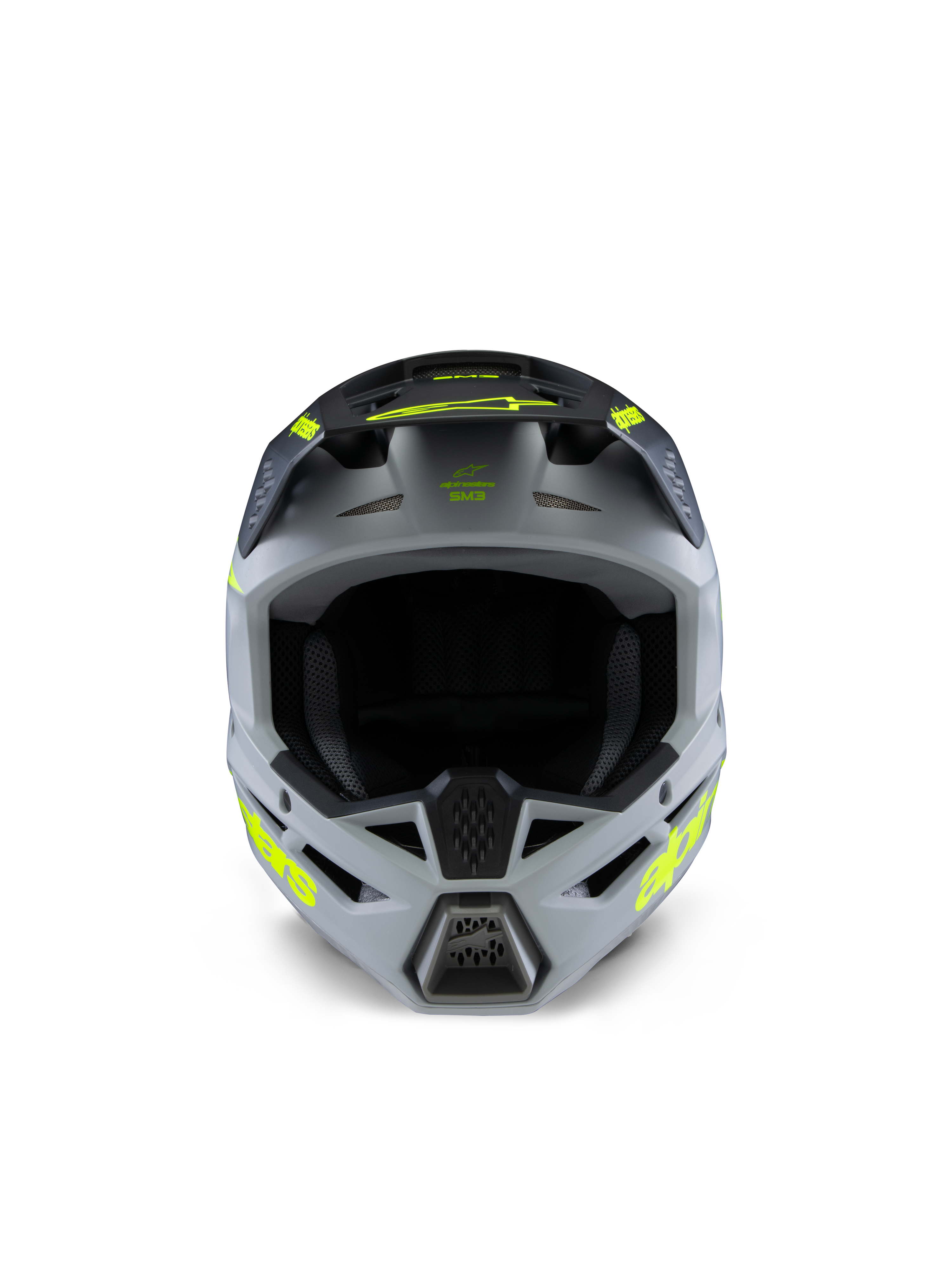 Casco Alpinestars S-M3 Youth Radium, casco da motocross, grigio, nero e giallo fluo opaco, vista frontale con calotta angolare aggressiva, loghi gialli vivaci sui lati e sul frontino, finitura opaca progettata per fuoristrada e competizioni MX per ragazzi.