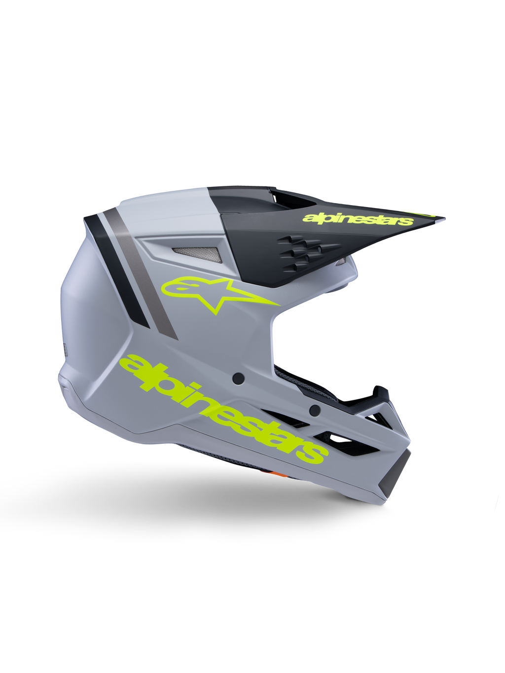 Alpinestars S-M3 Youth Radium Helmet ECE 22.06, casco da motocross per ragazzi, grigio opaco e nero con loghi giallo fluo, profilo laterale con logo e scritta Alpinestars, design aerodinamico con ventilazione integrata e visiera nera