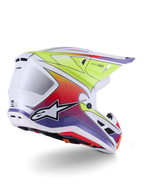 Casco Alpinestars S-M7 Fuse, casco da motocross, bianco, giallo fluo e viola lucido, grafiche sfumate multicolore vivaci con logo a stella in bianco e nero in evidenza, calotta aerodinamica in composito con prese d'aria integrate, progettato per le gare off-road