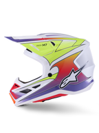 Casco Alpinestars S-M7 Fuse, casco da motocross, bianco, giallo fluo e viola lucido, vista laterale di profilo che mostra la calotta aerodinamica con grafiche sfumate colorate, prese d'aria nere e logo Alpinestars bianco, equipaggiamento da gara off-road ad alte prestazioni