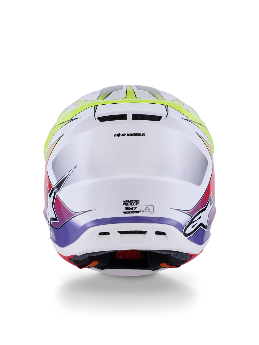Casco Alpinestars S-M7 Fuse ECE 22.06, casco da motocross, bianco, giallo fluo e viola lucido, vista posteriore che mostra le prese d'aria integrate, branding Alpinestars e loghi laterali, design aerodinamico della calotta.