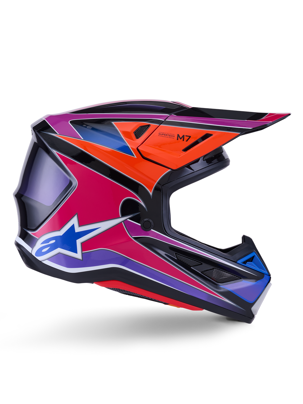Casco Alpinestars S-M7 Fuse, casco da motocross, blu, viola e rosa lucido, vista di profilo con grafiche racing vivaci, design aerodinamico con prese d'aria e logo a stella Alpinestars