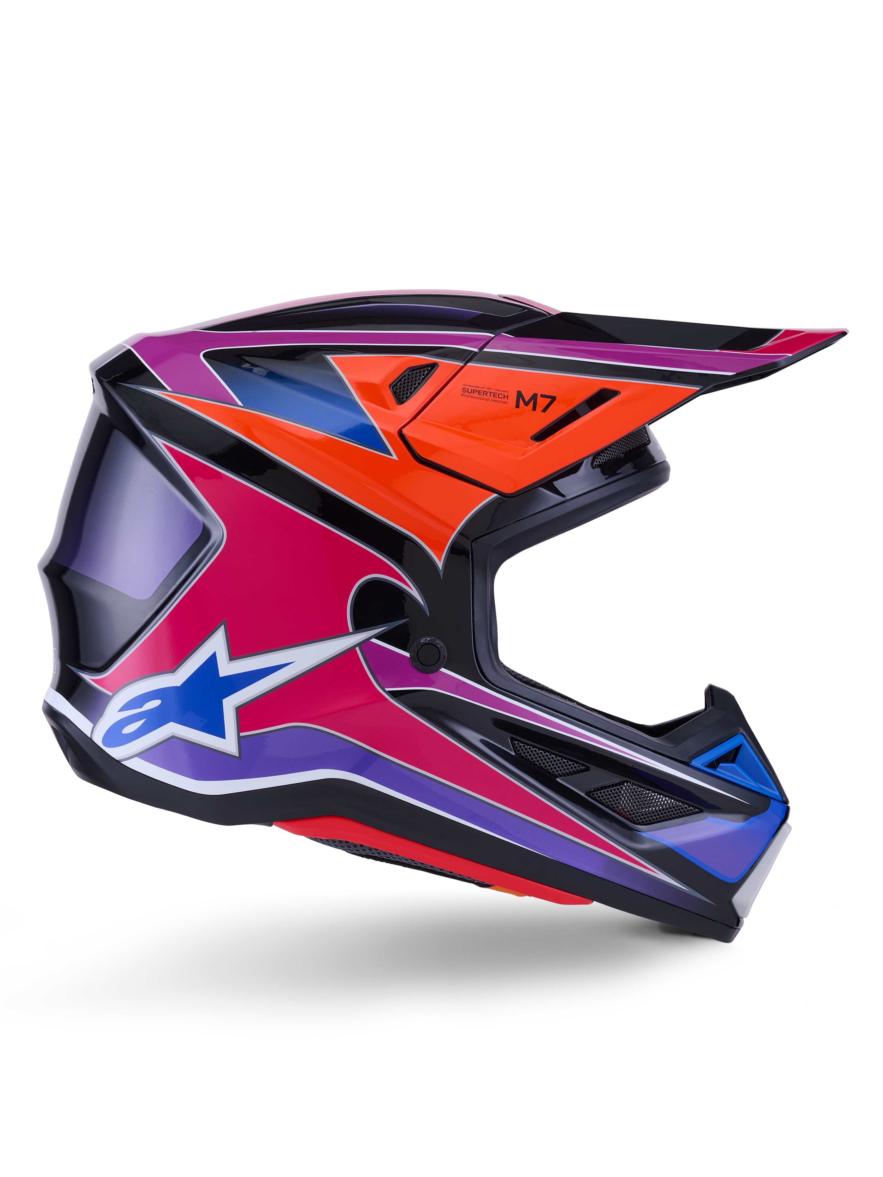 Casco Alpinestars S-M7 Fuse, casco da motocross, blu, viola e rosa lucido, vista di profilo con grafiche racing vivaci, design aerodinamico con prese d'aria e logo a stella Alpinestars