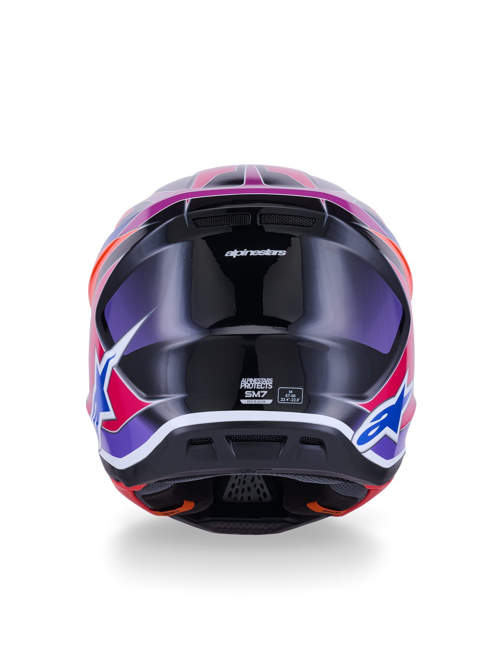 Casco Alpinestars S-M7 Fuse, casco da motocross, vista posteriore, blu viola rosa lucido, grafiche vivaci rosa e viola su calotta nera lucida, con prese d'aria ed etichetta di certificazione ECE 22.06