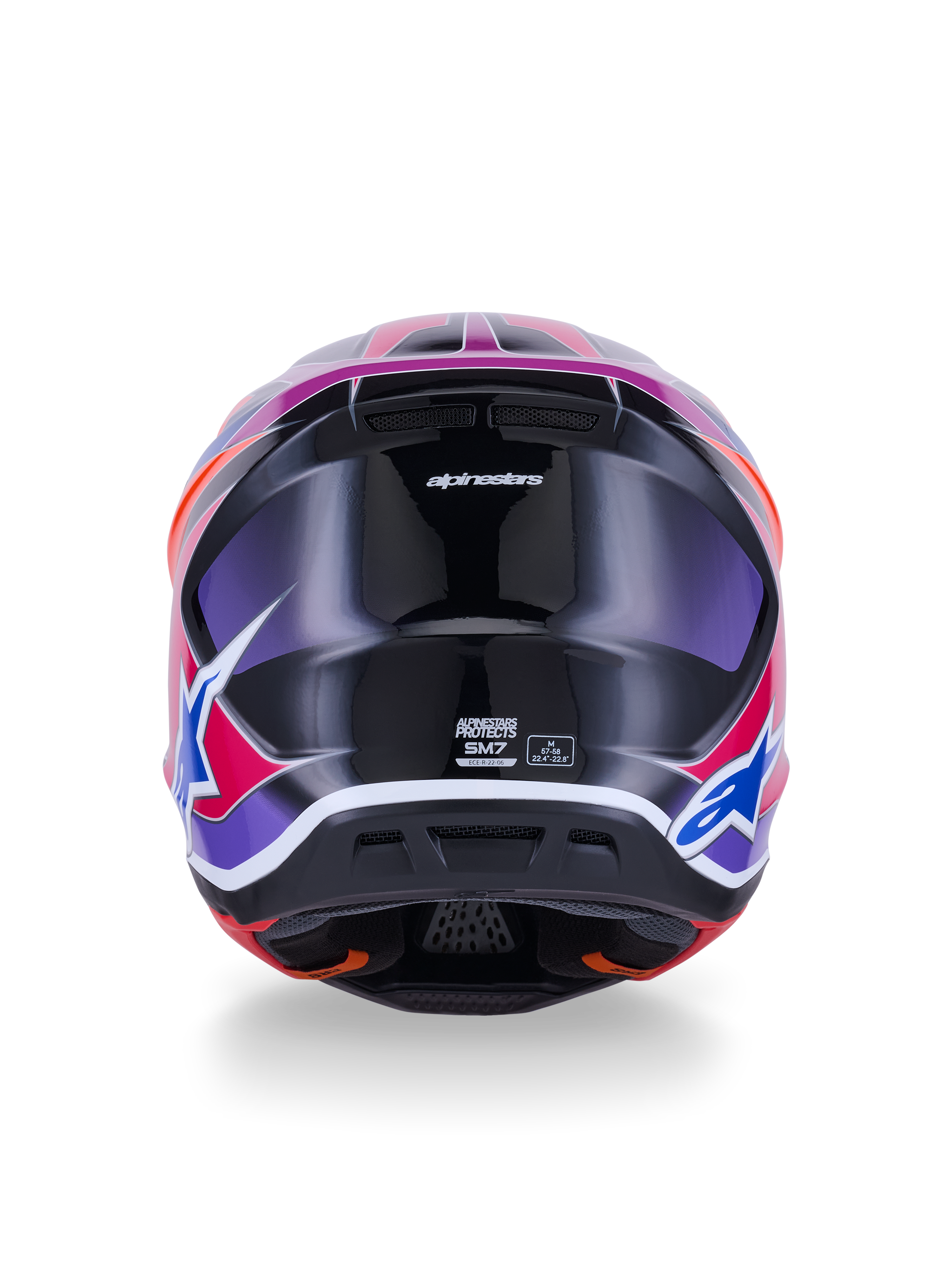 Casco Alpinestars S-M7 Fuse, casco da motocross, vista posteriore, blu viola rosa lucido, grafiche vivaci rosa e viola su calotta nera lucida, con prese d'aria ed etichetta di certificazione ECE 22.06