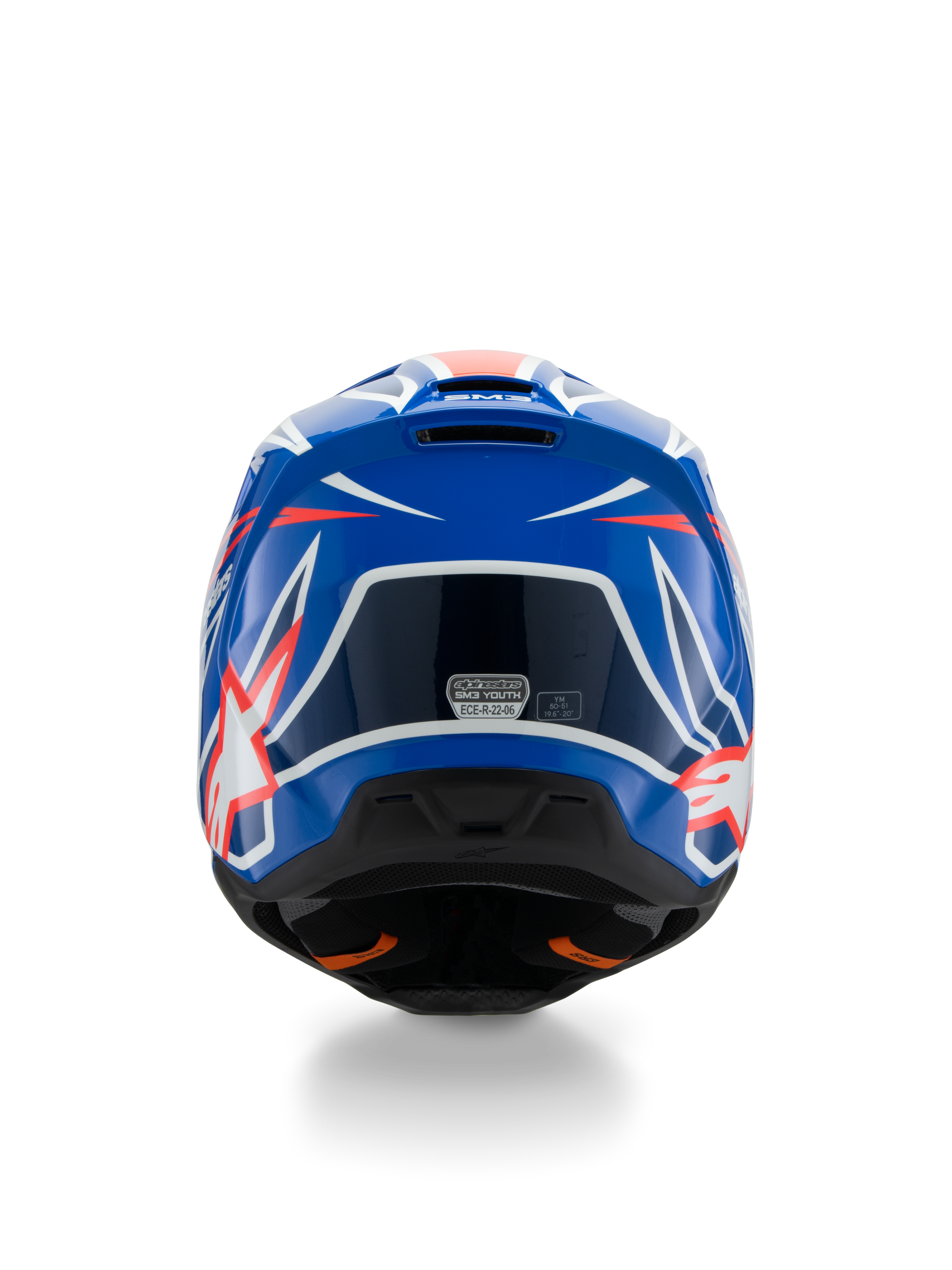Alpinestars S-M3 Youth Wurx Helmet ECE 22.06, casco da motocross, blu, rosso e bianco, vista posteriore che mostra il design aerodinamico con bocchette di scarico, finitura lucida con accenti grafici nitidi e adesivo di certificazione di sicurezza.