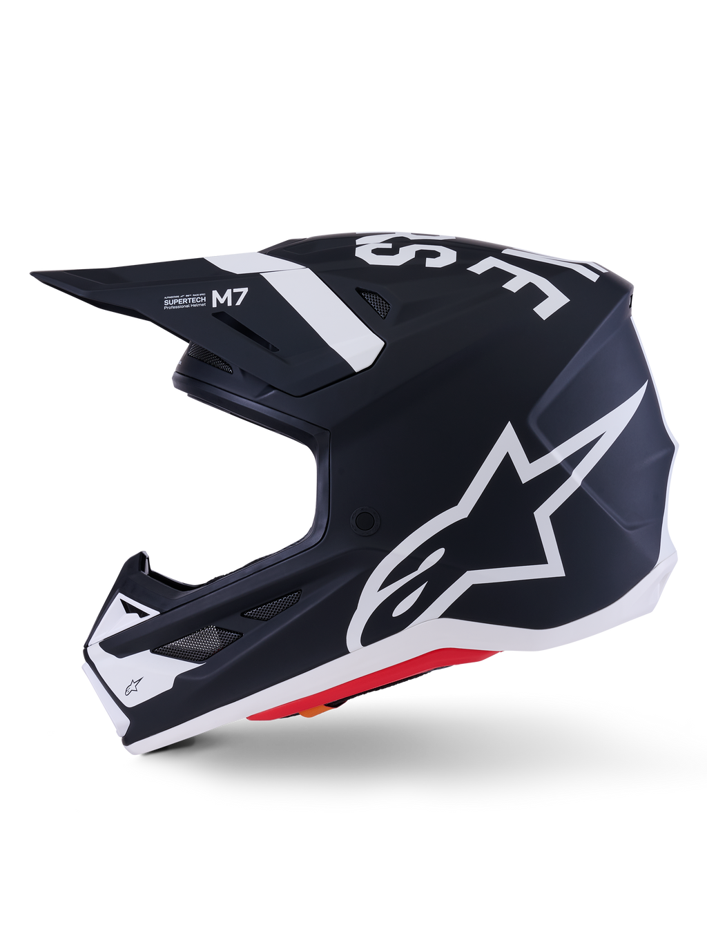 Casco Alpinestars S-M7 Dasher ECE 22.06, nero opaco e bianco, profilo laterale con grande logo Alpinestars bianco, calotta aerodinamica in composito con prese d'aria e bordo inferiore rosso, protezione professionale per la testa da motocross