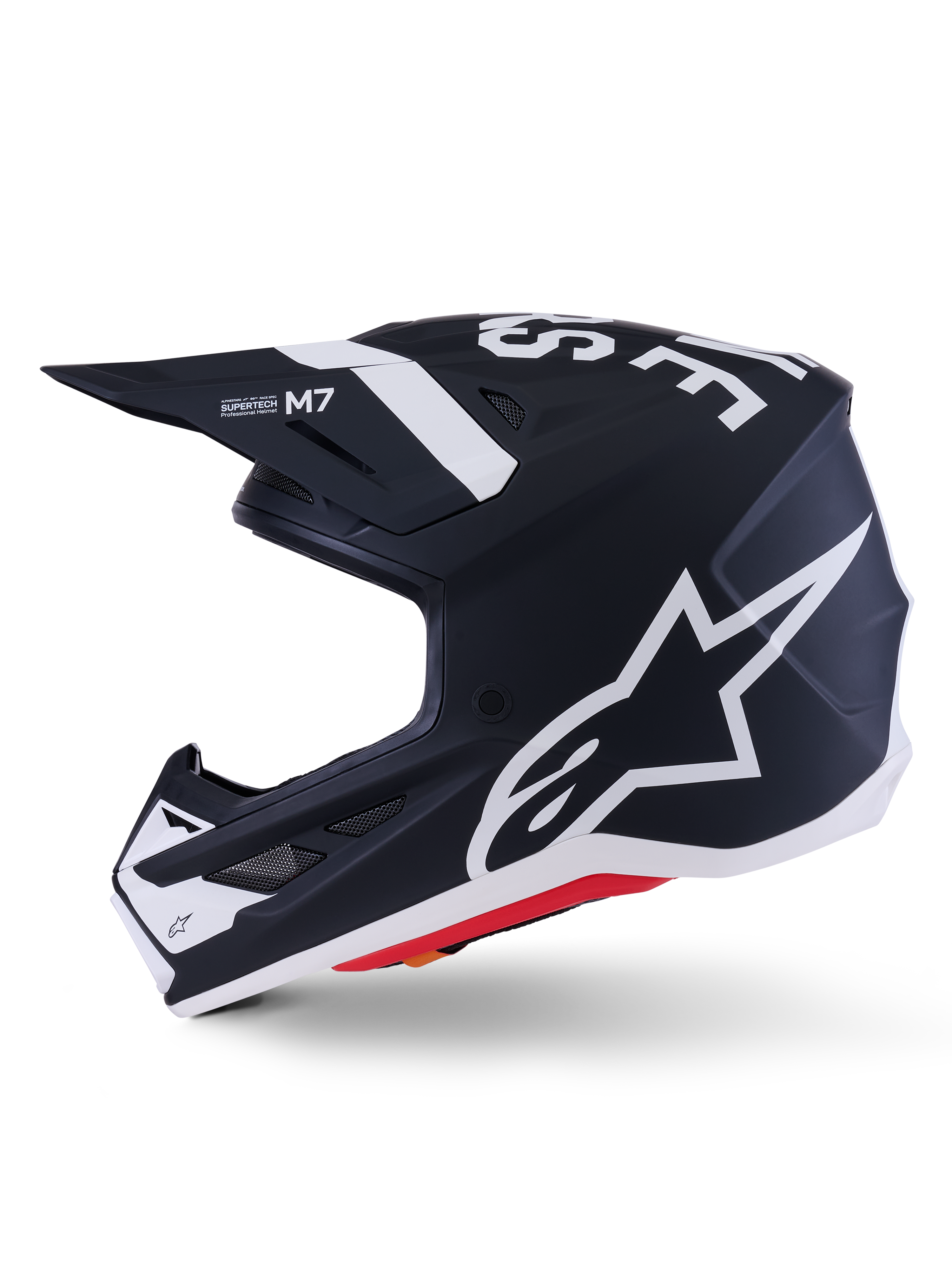 Casco Alpinestars S-M7 Dasher ECE 22.06, nero opaco e bianco, profilo laterale con grande logo Alpinestars bianco, calotta aerodinamica in composito con prese d'aria e bordo inferiore rosso, protezione professionale per la testa da motocross