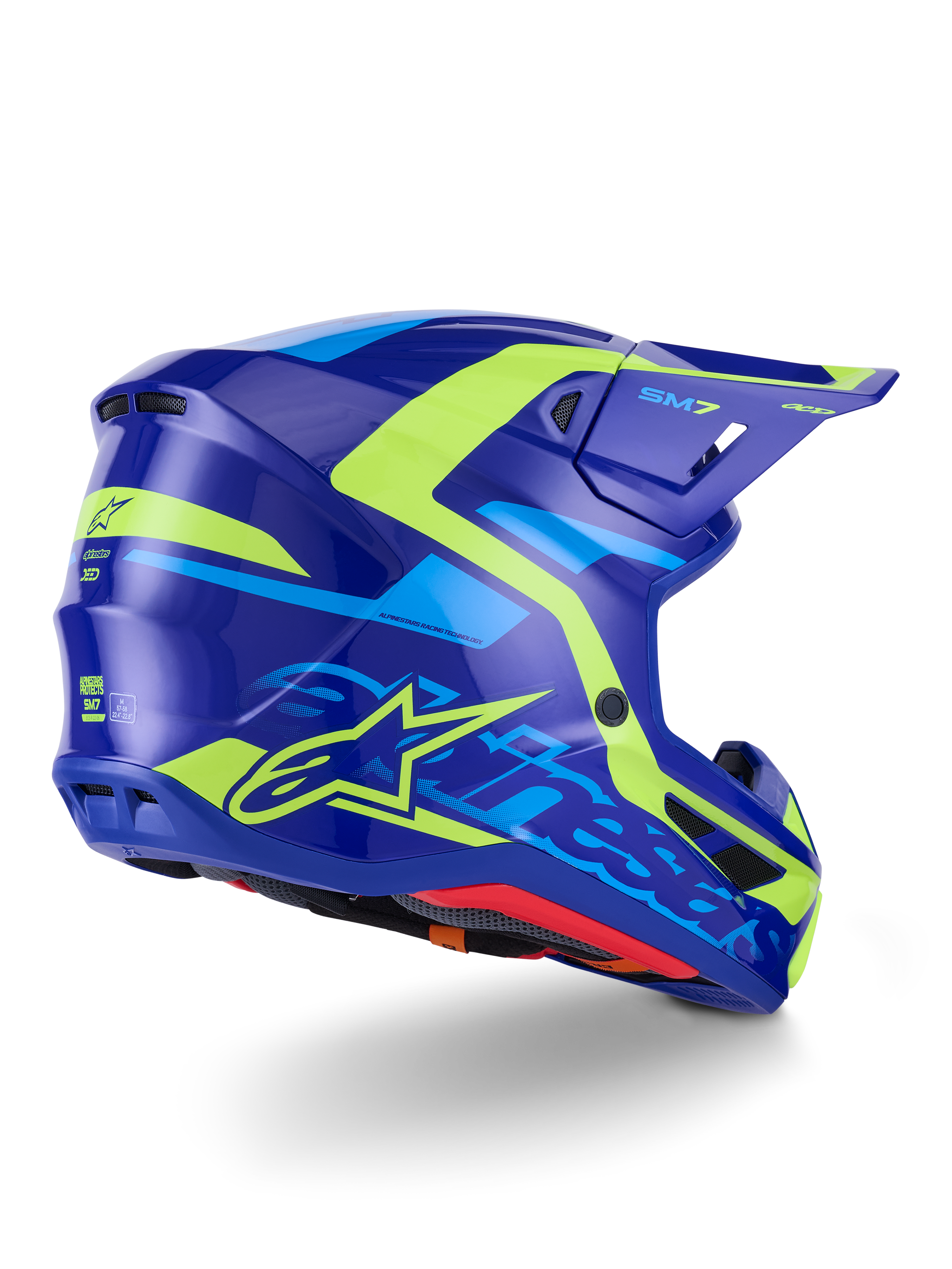 Alpinestars S-M7 Deed Helmet ECE 22.06, casco da motocross, blu e giallo fluo lucido, vista laterale-posteriore caratterizzata da un profilo della calotta aerodinamico, branding Alpinestars con vivaci accenti giallo neon, prese d'aria ad alte prestazioni e finitura lucida per competizioni off-road.
